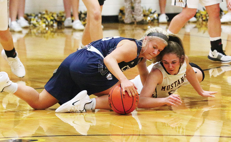 Cross County senior Mackinzie Cole, JJ Mertz